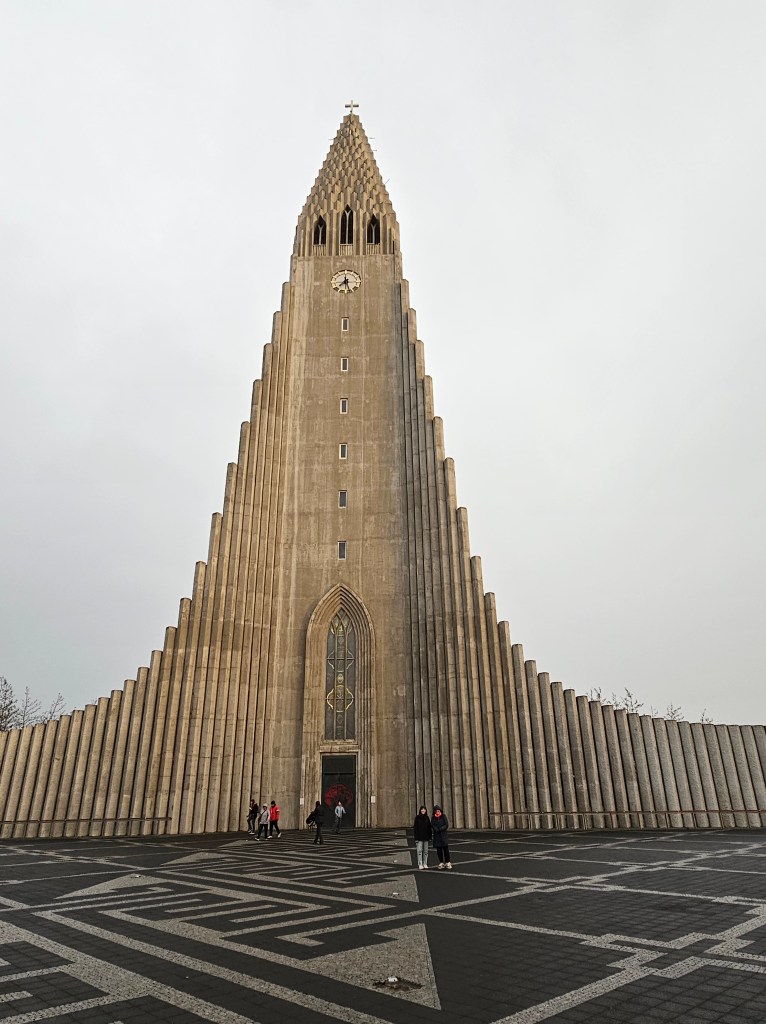 Marina and Emily in front of Hallgrimskirkja church, from a distance
